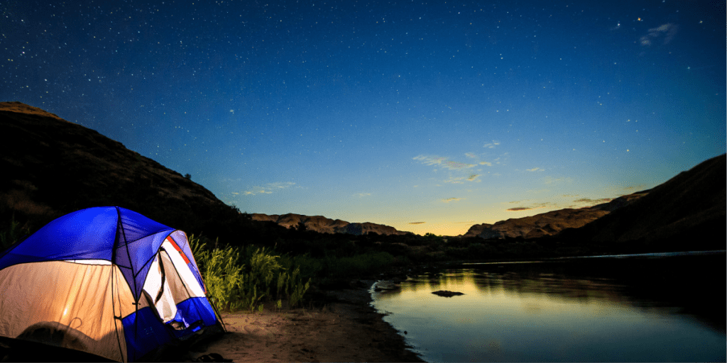 tent at lake at night